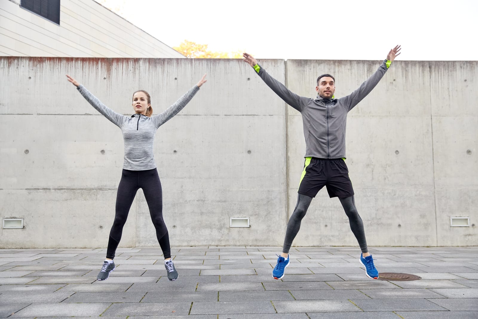 Couple Jumping Jacks Urban