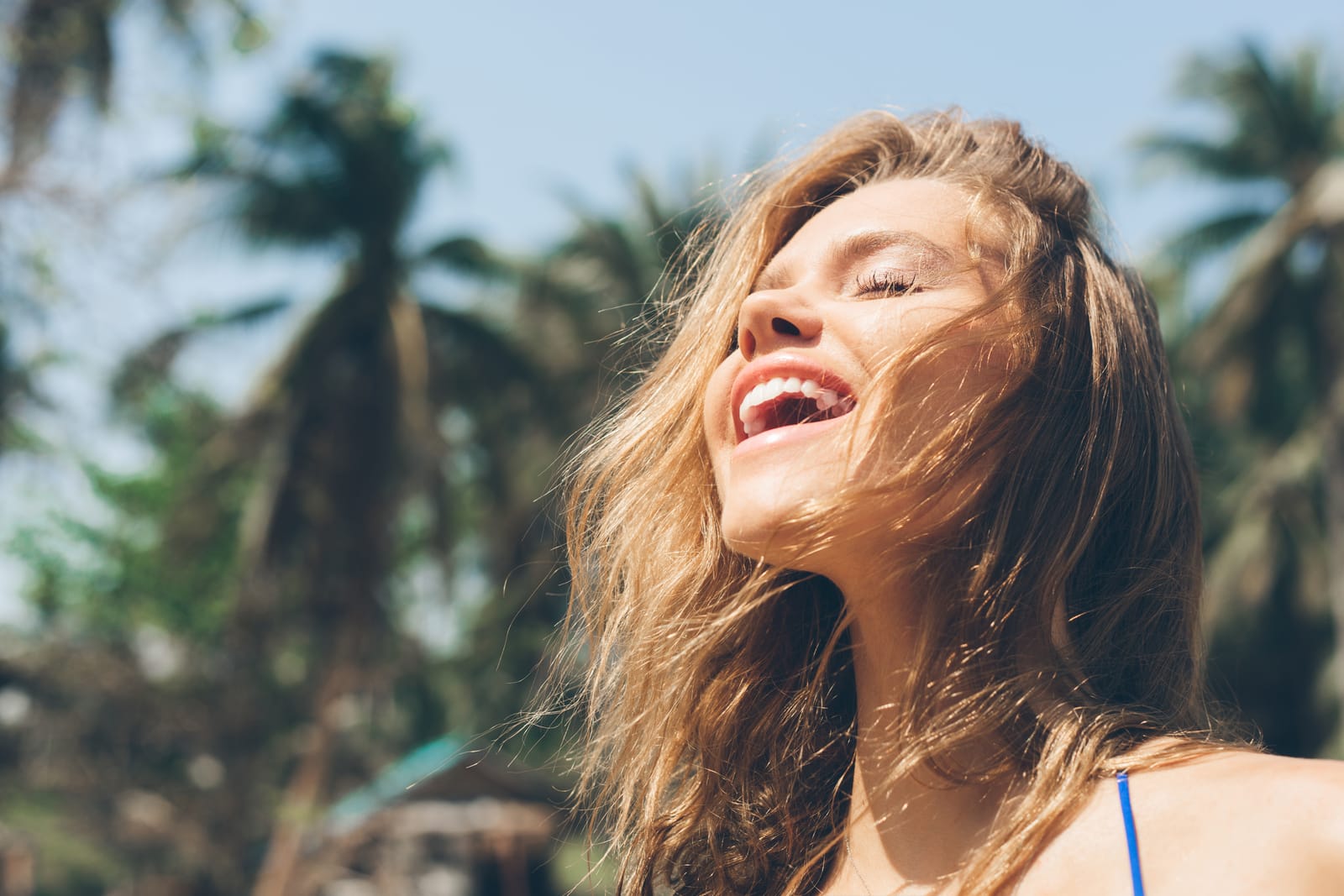 Woman Laughing Tropical Palm Trees