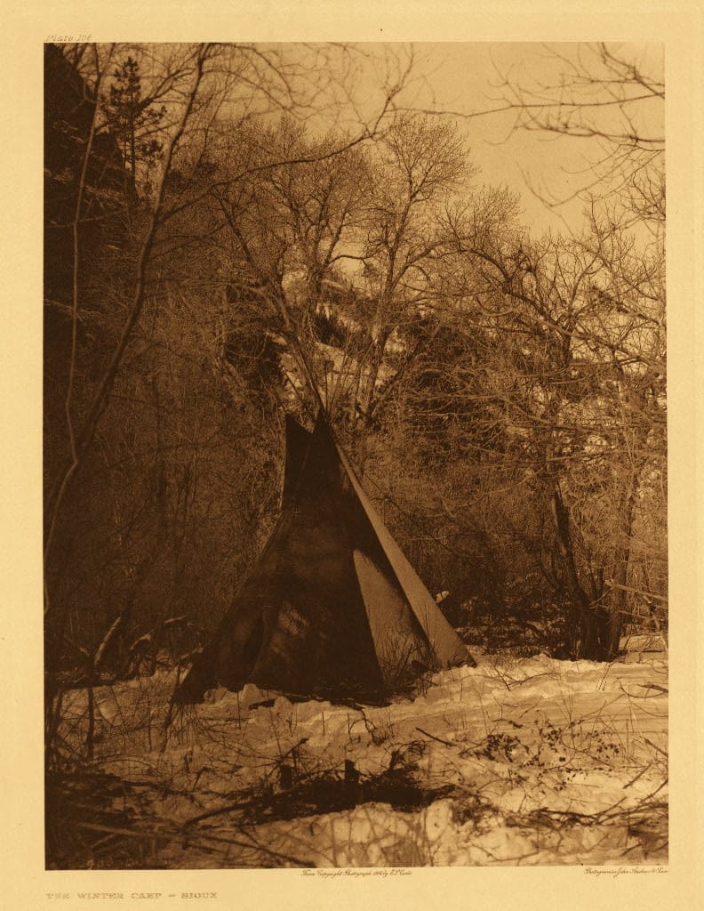 Tipi Among Bare Trees Winter