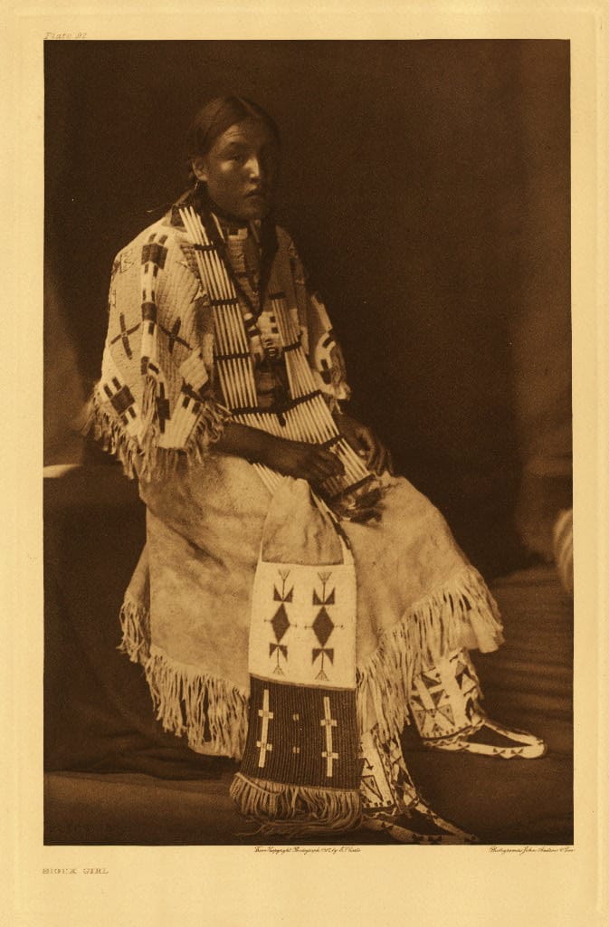 Young Woman Beaded Dress Seated