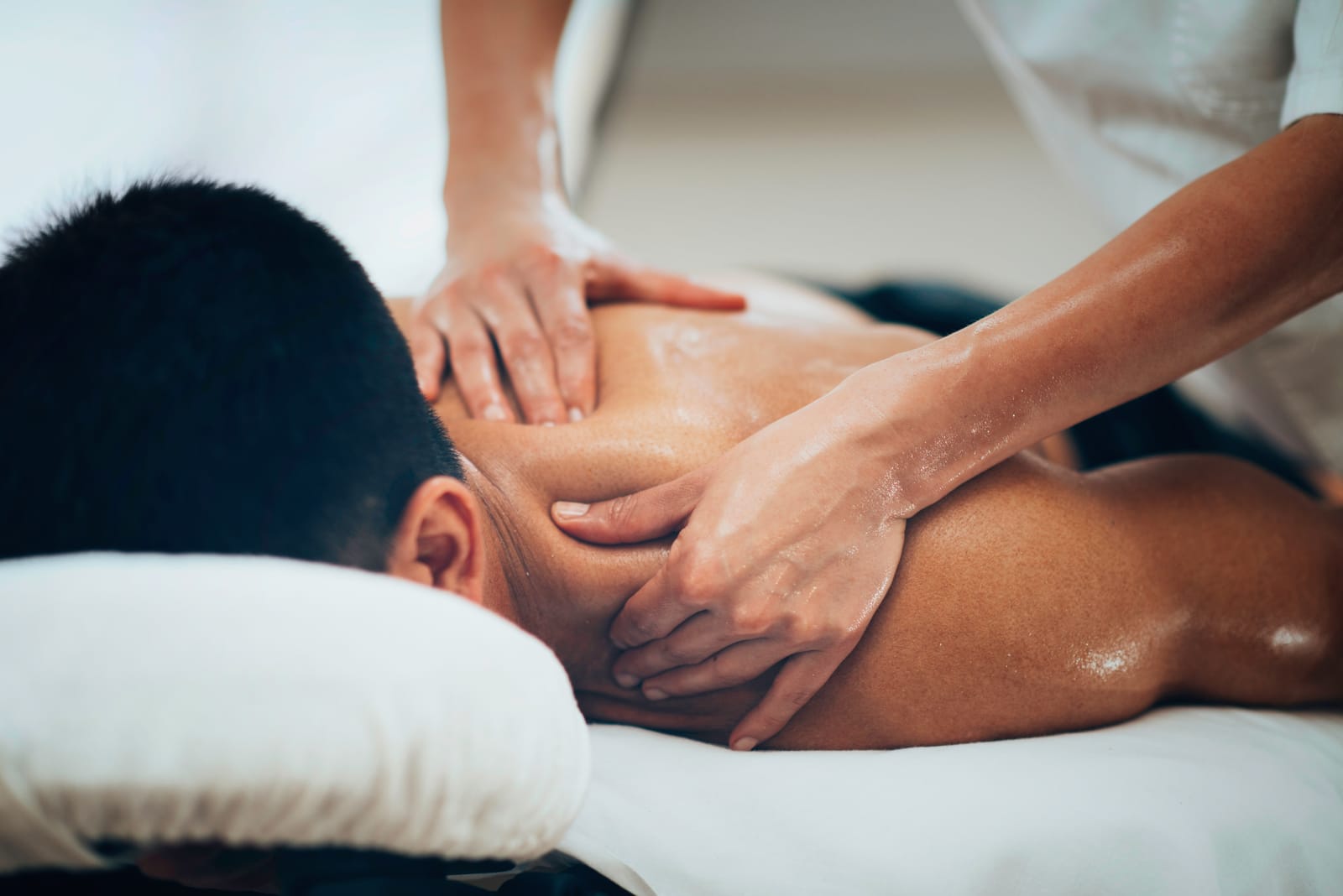 Man Receiving Back Massage Table